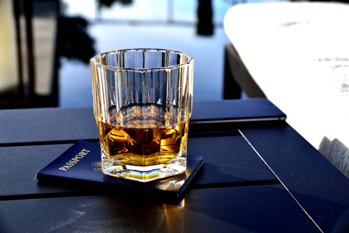 passport and alcohol drink