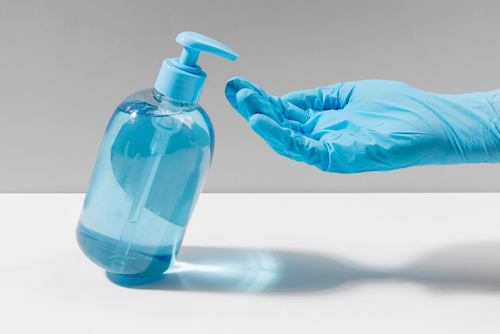 Breathalyser hygiene and sanitation with sanitiser solution and glove