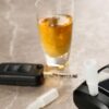 A modern breathalyser rests on a brown marble table, showcasing the design evolution of breathalysers