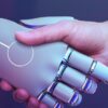 ai and humans shake hands to demonstrate The Role of AI in Detecting Unusual Breathalyser Readings