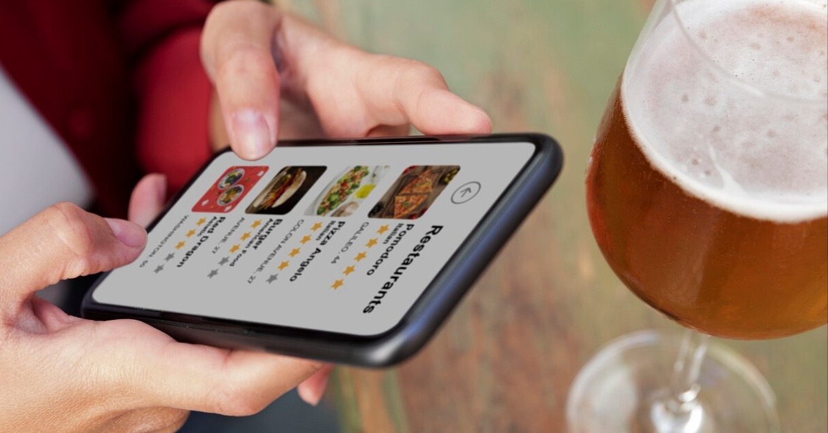 woman uses gamified breathalyser app on phone