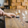 man avoiding taking car keys before breathalyser use