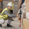 shift worker in warehouse doing packaging after using breathalyser
